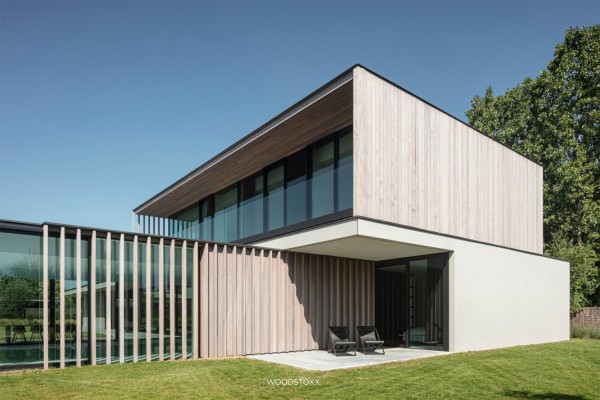 realisation facade cladding in afrormosia wood planchettes and beams