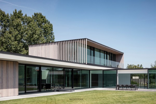 realisation facade cladding in afrormosia wood planchettes and beams