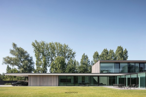 realisation facade cladding in afrormosia wood planchettes and beams