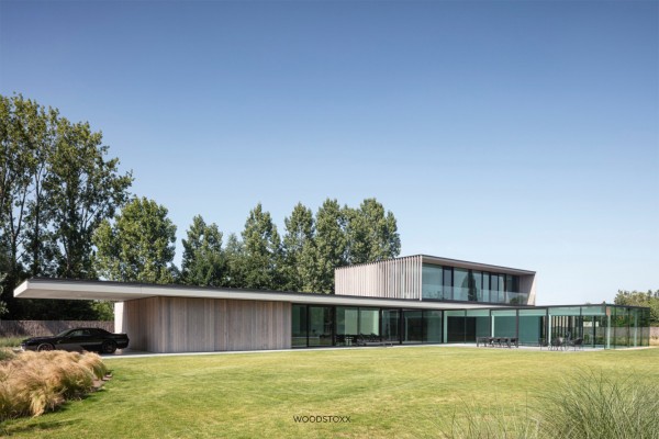 realisation facade cladding in afrormosia wood planchettes and beams