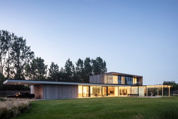 realisation facade cladding in afrormosia wood planchettes and beams