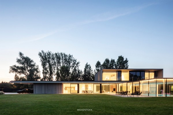 realisation facade cladding in afrormosia wood planchettes and beams